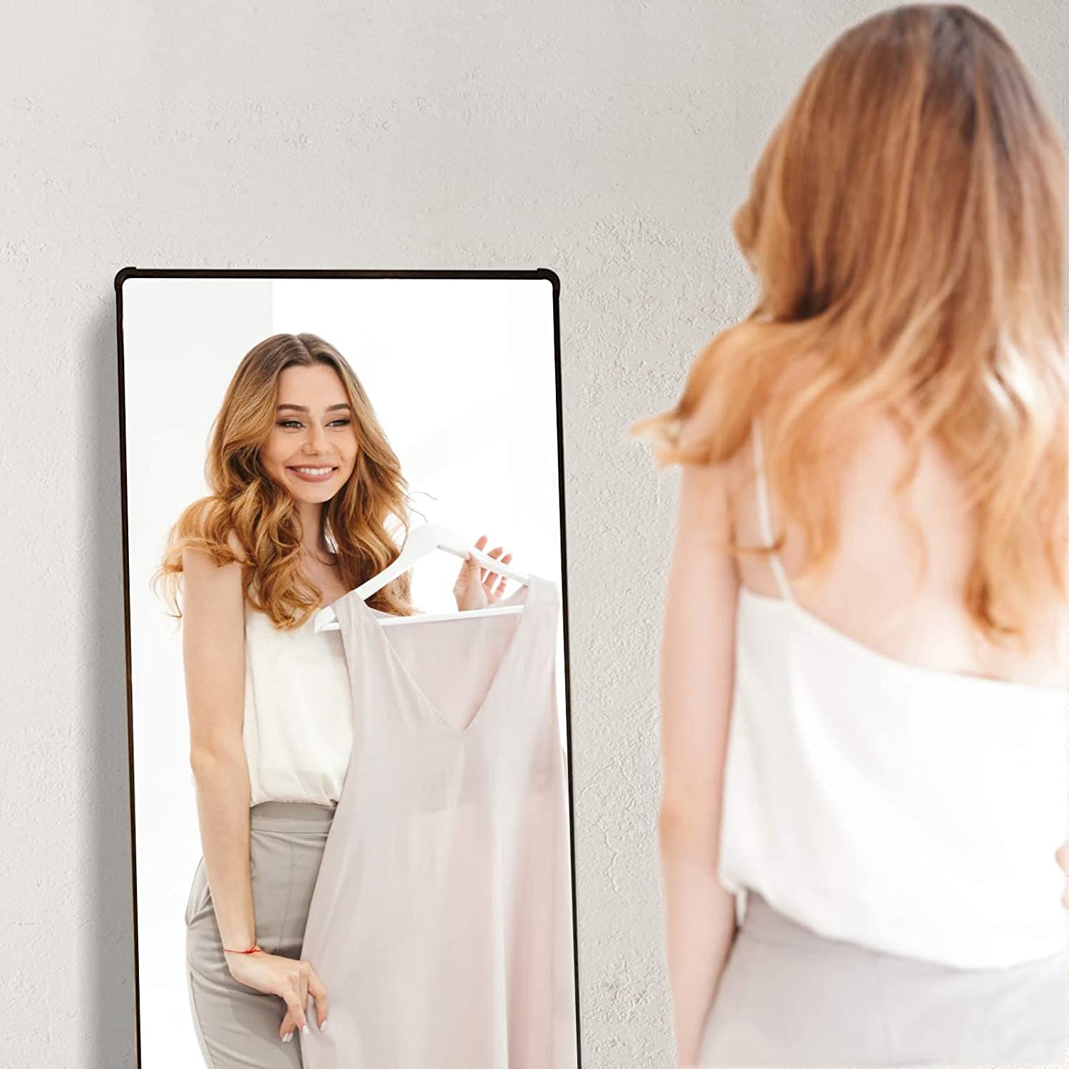 Rectangular Framed Freestanding Mirror in Black.