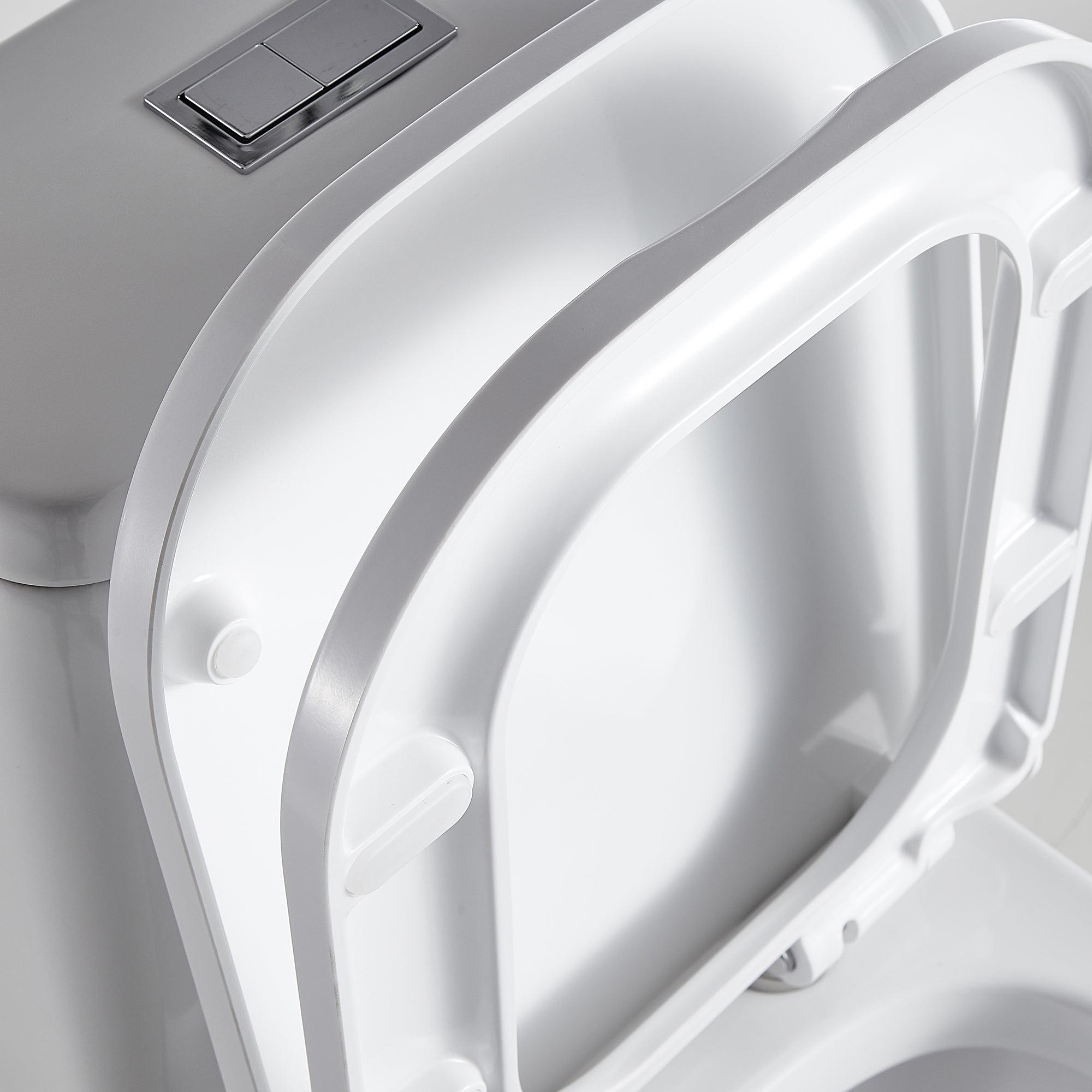 1-piece 0.88/1.28 GPF Dual Flush Elongated Toilet in White Seat Included