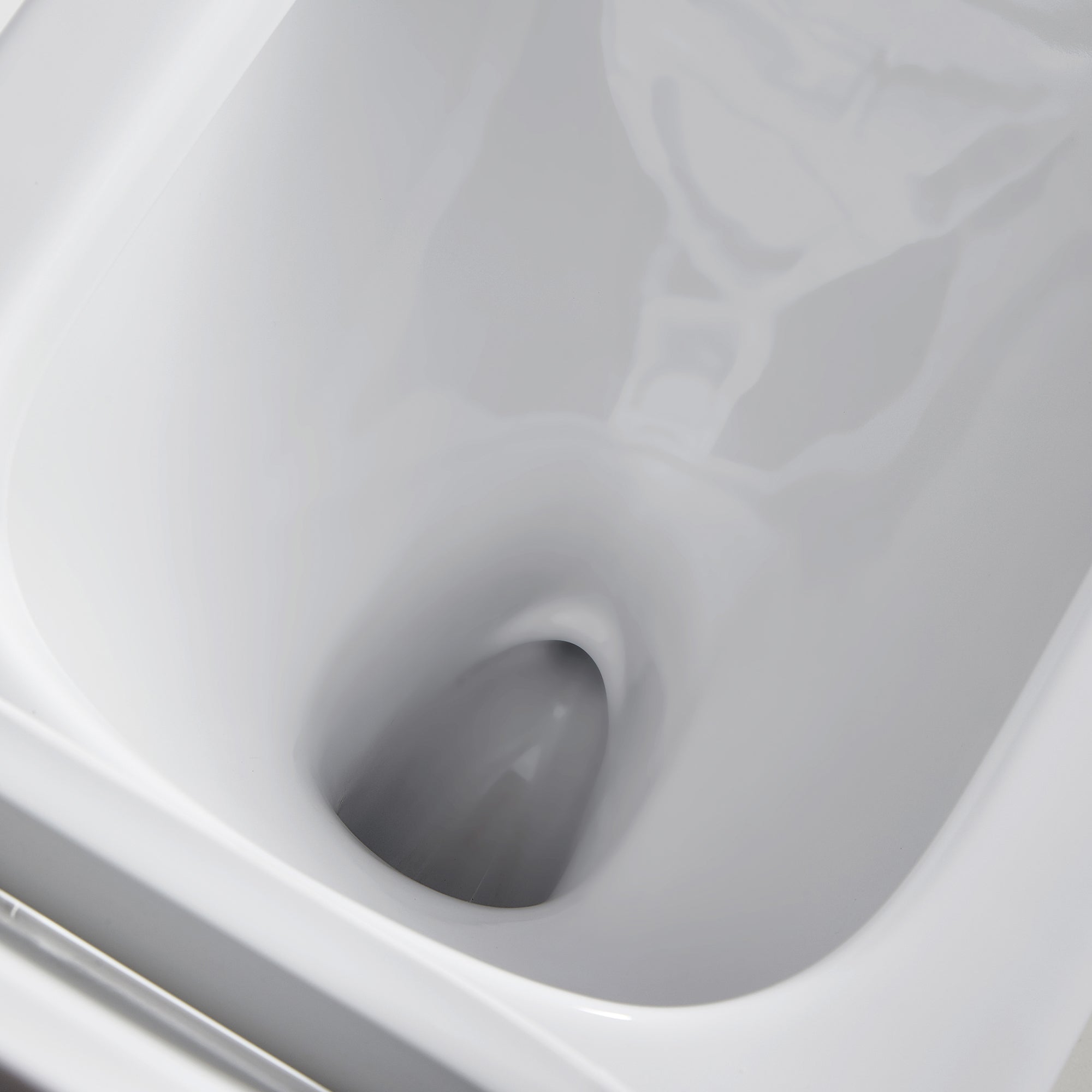 1-piece 0.88/1.28 GPF Dual Flush Elongated Toilet in White Seat Included